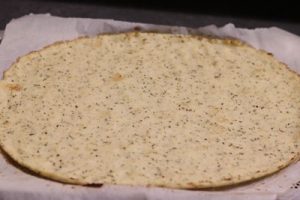 pizza avec une pâte à base de chou fleur une pincee de cuisine